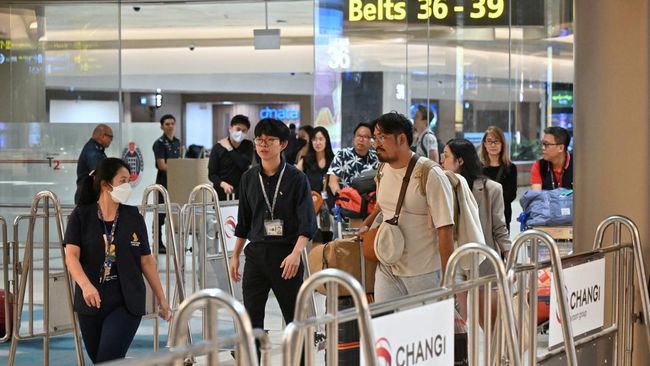 Mencegah Penyebaran Mpox: Bandara Changi Singapura Tingkatkan Pengawasan dengan Alat Pengukur Suhu